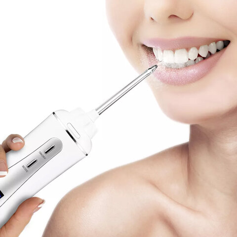 Ирригатор для полости рта KITFORT КТ-2913, портативный, емкость резервуара 0,35 л, 2 насадки, белый